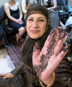 party guest showing her henna