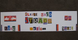 sign that hangs over yoga straps in the studio