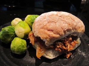 pulled pork sandwich with brussel sprouts