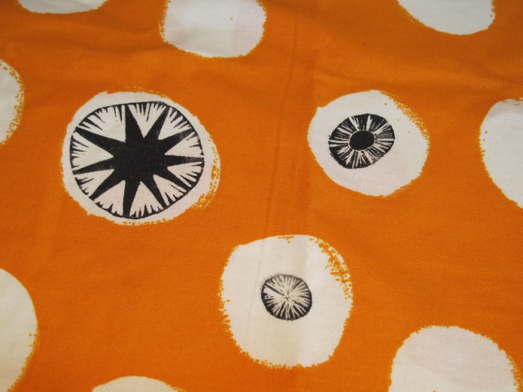 orange spotted apron detail orange spotted apron detail