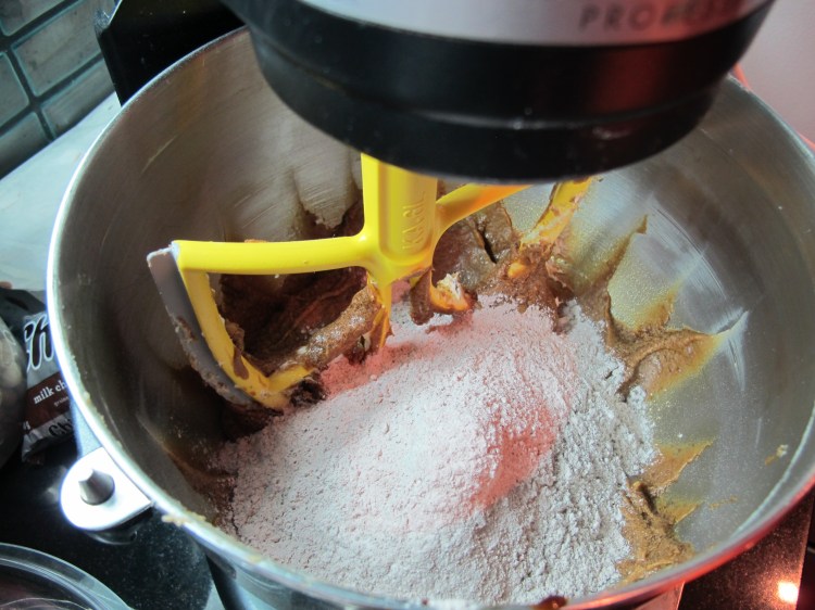 adding some of flour mixture