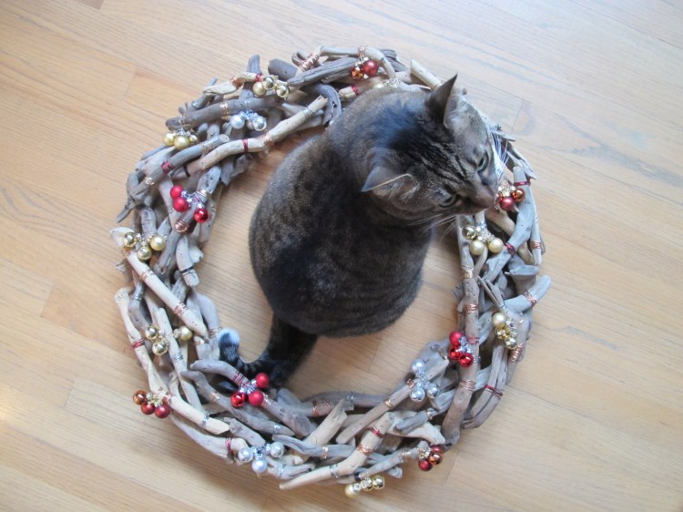 Kush sitting in wreath