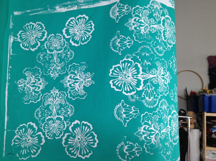 white on turquoise fabric