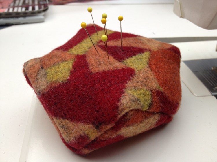 red and orange pincushion
