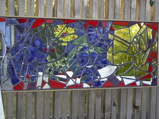 mosaic mirror showing mural